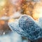 Winter Background - Woman hands in gloves with Flying Snowflakes