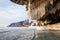 Winter Baikal with clear ice and reflection of rocks