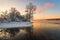 Winter bank of the Yenisei river sunset