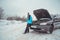 Winter car breakdown - woman call for help, road assistance