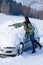 Winter car - woman remove snow from windshield