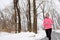 Winter cardio exercise - woman jogging running