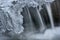 Winter Cascade Framed by Ice