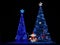 Winter Christmas decorative Lights display of multiple christmas Tree