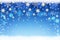 Winter Christmas holiday bokeh background with snow and snowflakes