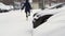 Winter city. Cars covered by snow after a snow blizzard