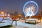 Winter cityscape of Gdansk at dusk with ferris wheel, Poland