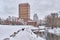 Winter cityscape of Yekaterinburg, Russia. Embankment of Iset river. Modern and old architecture.