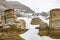 Winter clings to the hoodoos as spring arrives in the badlands. Drumheller Alberta,Canada