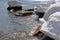 Winter coast of the Black Sea on a clear frosty day. Stones in the water.