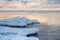 Winter coastal landscape with big ice fragments