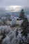 Winter coming. Picturesque pre sunrise scene above late autumn mountain countryside with hoarfrost on grasses, trees, slopes.