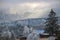 Winter coming. Picturesque pre sunrise scene above late autumn mountain countryside with hoarfrost on grasses, trees, slopes.