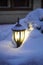 Winter composition in the snow. lantern shines in the snow on the eve of Christmas and New Year. Background for