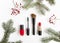 Winter cosmetics collage decorated with fir tree and berries on white background. Flat lay, top view