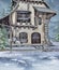 Winter cottage with a wooden fence