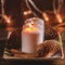 Winter cozy decoration with white burning candles on a wooden festive table and blurrred lights