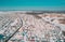 Winter day Timelapse Dronelapse Hyperlapse. Aerial View Of Town Village Cityscape Skyline Traffic In Snowy Landscape