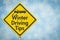 Winter Driving Tips yellow warning road sign with car crash