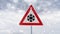 Winter driving - warning sign - risk of snow and ice