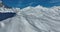 Winter drone shot of ski pistes and slopes covered with fresh powder snow in Tignes in Valdisere France