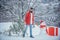 Winter emotion. Young woodcutter winter portrait. Man is going to cut a Christmas tree. Bearded man with freshly cut