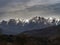 Winter evening landscape with snow on the peaks in the Apennines, Italy. View from Villafranca in Lunigana.