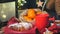 Winter evening table with hot chocolate, bun and tangerines