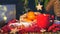 Winter evening table with hot chocolate, bun and tangerines