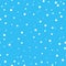 Winter falling simple snowflakes on a light blue background. Seamless abstract pattern. The design elements or gifts for