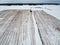 Winter fallow stubble agriculture field with snow, aerial