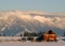 Winter Farm and Mountains