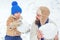 Winter, father and son play outdoor. Happy family plaing with a snow on a snowy winter walk. Father and son making