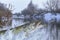 Winter fishing. Big pike fish jumping with splashing in water