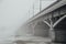 Winter fog in Voronezh. Chernavsky bridge fading in fog