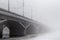 Winter fog in Voronezh. Chernavsky bridge fading in fog