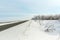 Winter frozen asphalt road highway snow covered