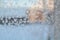 Winter frozen window snow hoar frost snowflakes glass pattern