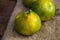 Winter fruits on wooden floor, quince, pomegranate, mandarin pictures