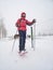 Winter hiking on snowshoes at electric fence of horse paddock