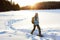 Winter hiking sport activity woman snowshoeing