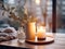 Winter holiday season festive dining table decoration with candles and beautiful tableware, elegant table decor