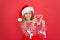 Winter holidays. Her favorite season. Shopping concept. Buy goods. Christmas decorating ideas. Child Santa Claus hat