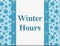 Winter hours sign with snowflakes
