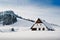 Winter idyllic with small hut