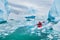 Winter kayaking in Antarctica, adventurous man paddling on sea kayak between icebergs