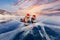 Winter lake Baikal Russia, two tourist women friends in red cap are skating on ice frozen sunset