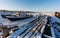 Winter landscape, abandoned fishery ships parked on snow at frozen lake Baikal, Russia in winter