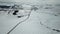 Winter landscape. Aerial view of the snow-covered fields and the road