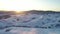 Winter landscape, beautiful snowy mountains. Closeup northern landscape. Snow-covered hills and mountains at sunrise